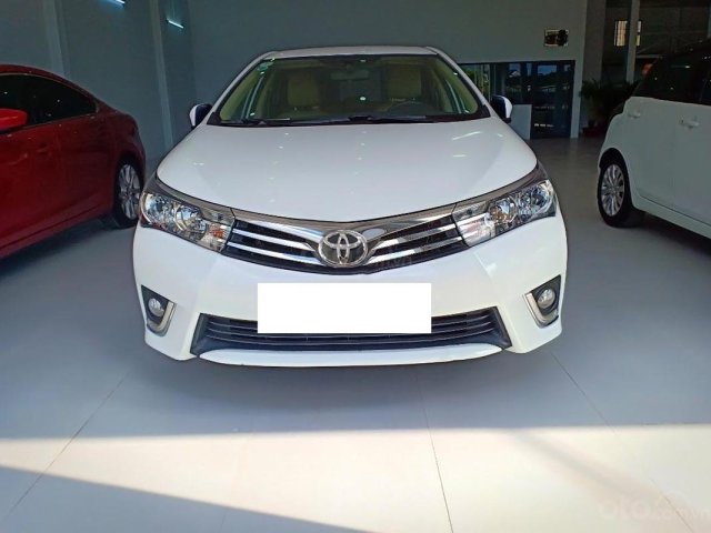 Cần bán lại xe Toyota Corolla altis 1.8G đời 2015, màu trắng0