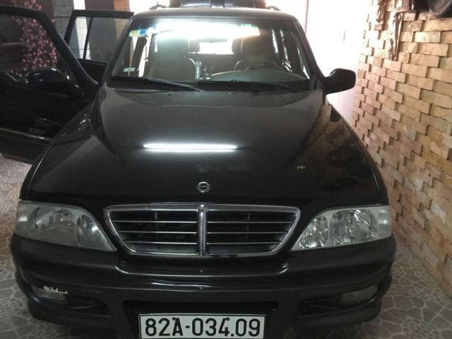 Bán lại xe Ssangyong Musso đời 2004, màu đen, nhập khẩu