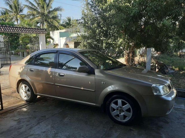 Cần bán Daewoo Lacetti Max 1.8 đời 2004, màu vàng