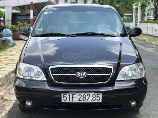 Cần bán xe Kia Carnival 2.5AT đời 2009, màu đen