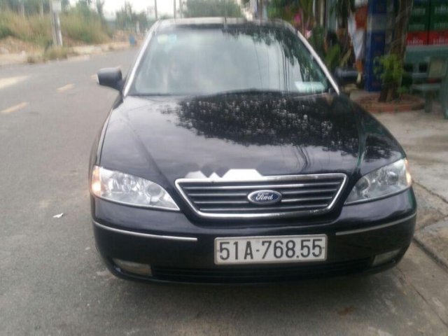 Cần bán lại xe Ford Mondeo đời 2003, màu đen, còn mới, giá 110tr0