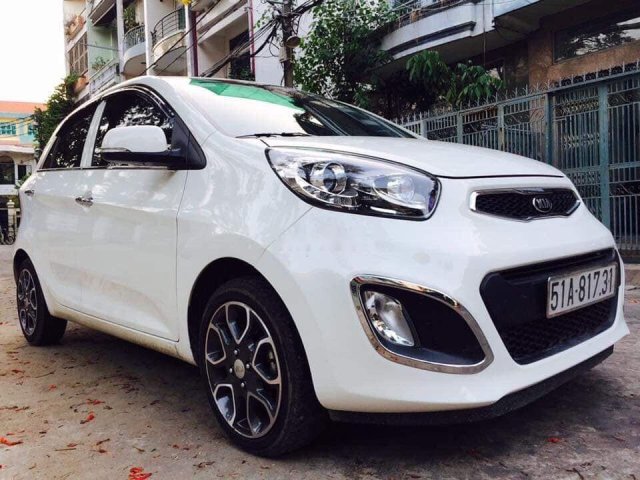 Bán xe Kia Picanto sản xuất 2014, màu trắng, ít đi, bảo dưỡng chính hãng định kì, không đâm đụng bơi lội