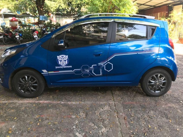 Cần bán xe Chevrolet Spark AT năm sản xuất 2015, màu xanh lam 0