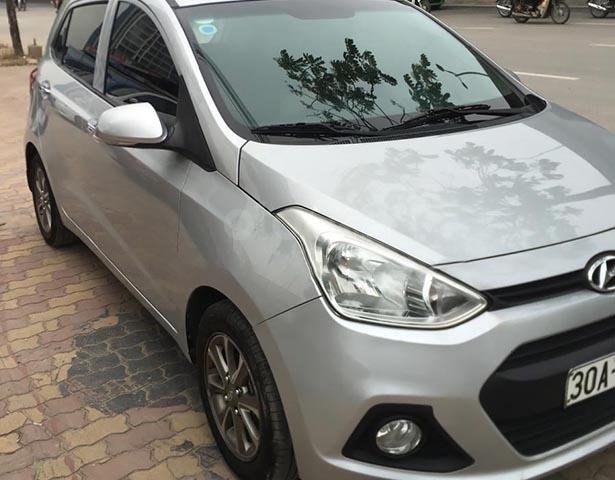 Bán Hyundai Grand i10 1.0 đời 2015, màu bạc, xe đẹp, không có lỗi0