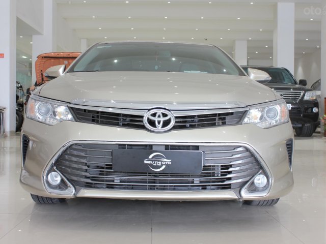 Cần bán Toyota Camry 2.5G đời 2016, màu vàng, biển SG0