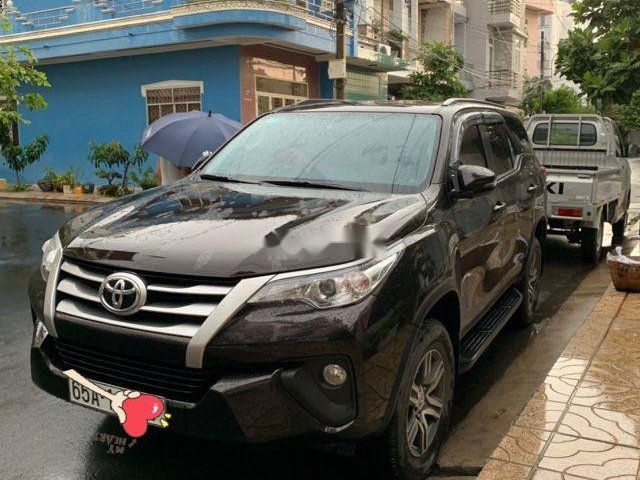 Bán Toyota Fortuner 2.4G 4x2 MT đời 2019, màu đen số sàn0