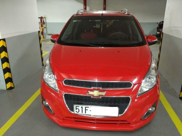 Cần bán lại xe Chevrolet Spark đời 2014, màu đỏ số tự động0