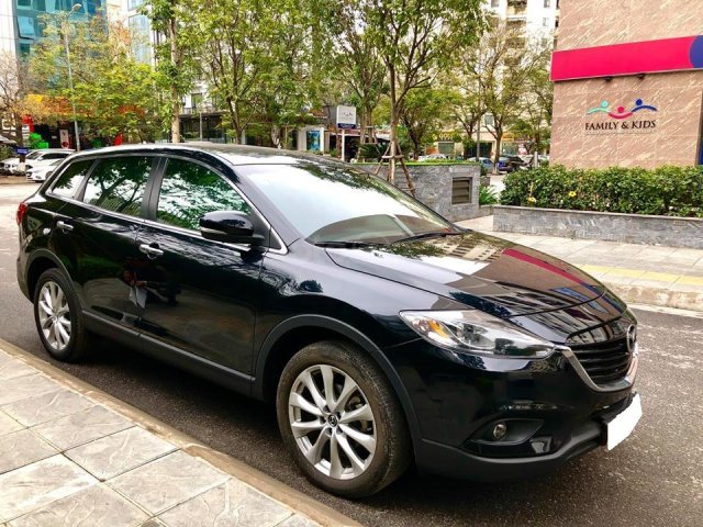 Cần bán xe CX9, sản xuất 2013, số tự động, nhập Nhật, màu đen huyền thoại