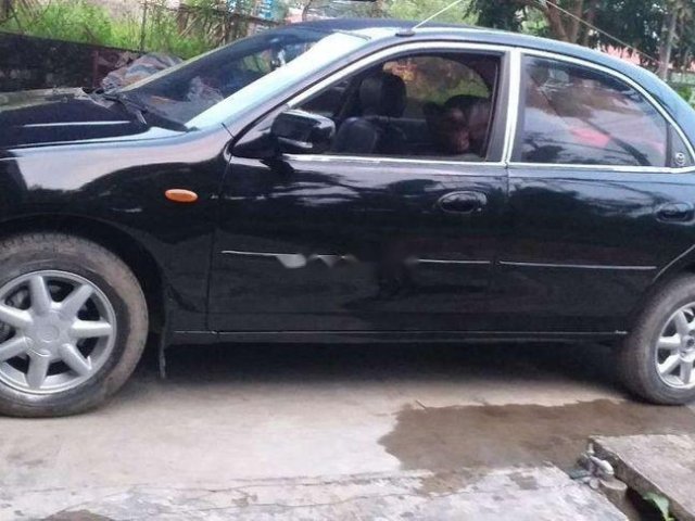 Bán Mazda 323 sản xuất năm 2000, màu đen, nhập khẩu 