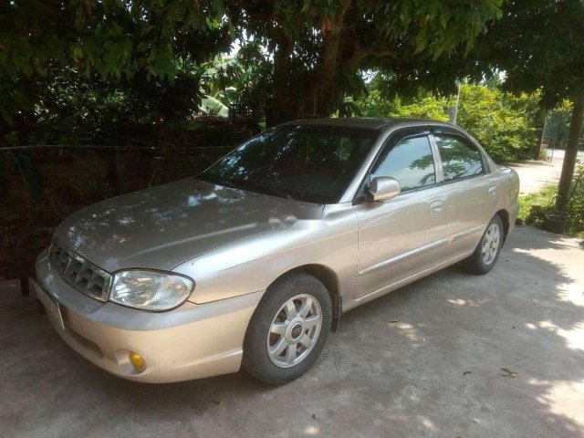 Cần bán Kia Spectra năm sản xuất 2005, màu vàng còn mới