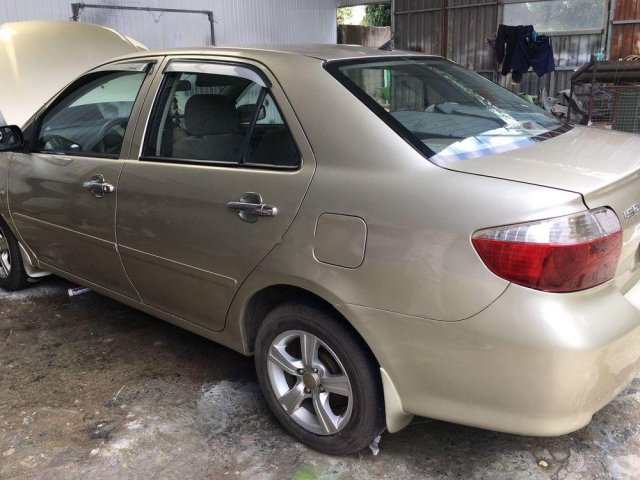 Bán Toyota Vios sản xuất 2003, màu vàng, giá tốt0