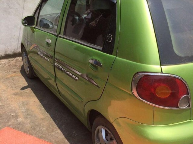 Gia đình bán Daewoo Matiz đời 2009, màu xanh cốm0