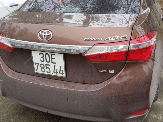 Bán Toyota Corolla Altis năm sản xuất 2015, màu nâu số sàn, giá 550tr