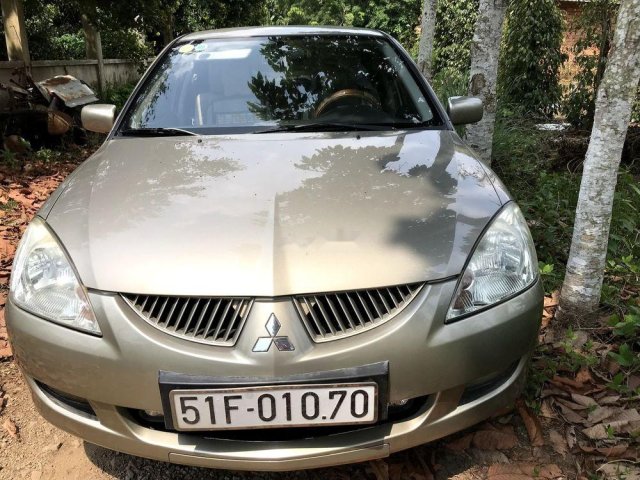 Bán Mitsubishi Lancer năm sản xuất 2005, màu vàng còn mới