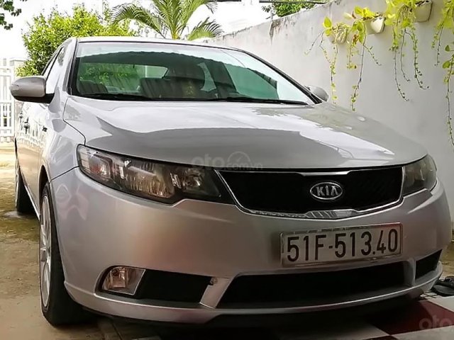 Bán xe cũ Kia Forte AT đời 2010, màu bạc0