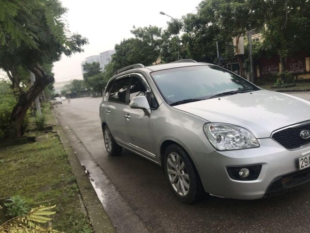 Cần bán xe Kia Carens đời 2011, màu bạc số tự động0