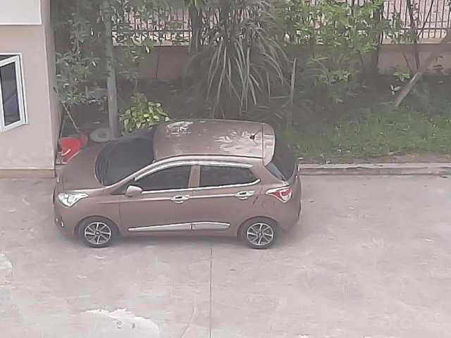 Bán Hyundai Grand i10 1.2 AT đời 2019, màu nâu, số tự động0