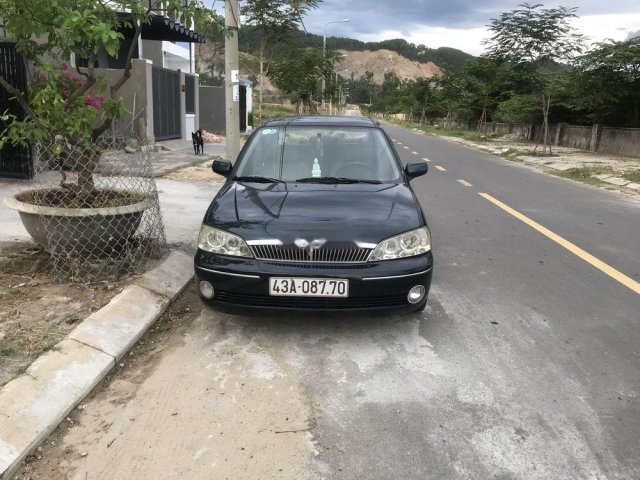 Bán xe Ford Laser 1.8 đời 2003, màu xanh lục, nhập khẩu, đi rất tuyệt