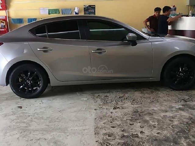 Bán Mazda 3 1.5 AT sản xuất 2016, màu bạc0