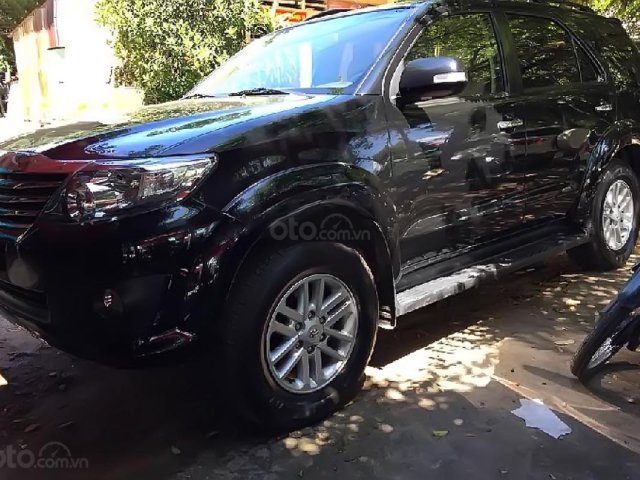 Bán Toyota Fortuner 2.7V 4x2 AT đời 2014, màu đen, xe gia đình 