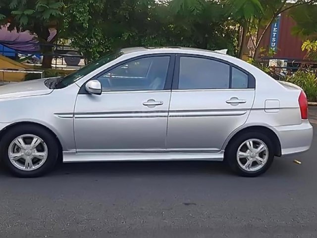 Cần bán Hyundai Verna 1.4 AT đời 2009, màu bạc, xe nhập  0