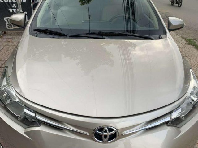 Bán xe Toyota Vios đời 2015, màu vàng, số sàn 0