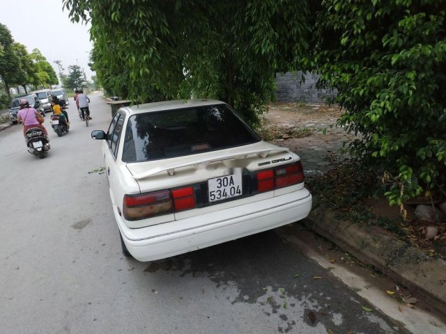 Bán Toyota Corolla 1.6l sản xuất 1996, màu trắng, xe nhập xe gia đình giá cạnh tranh