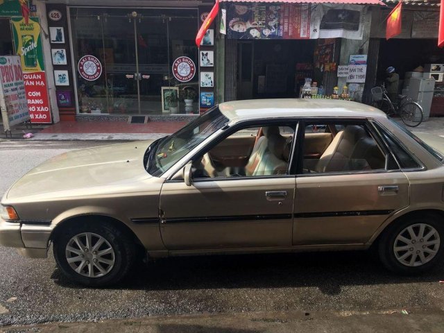 Bán xe Toyota Camry sản xuất 1995, màu vàng, nhập khẩu, giá chỉ 68 triệu