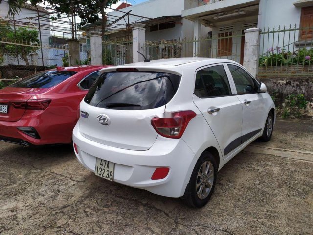 Chính chủ lên đời Hyundai Grand i10 năm sản xuất 2014, màu trắng, xe nhập0