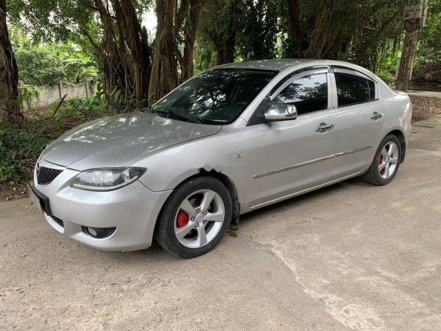 Bán xe Mazda 3 AT sản xuất năm 2004, màu bạc 0