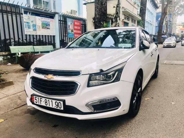 Cần bán Chevrolet Cruze 1.8LTZ đời 2016, màu trắng, xe gia đình0