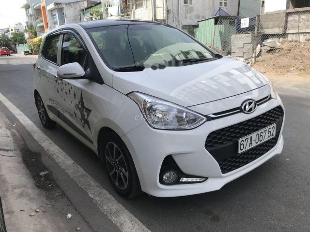 Bán xe Hyundai Grand i10 AT đời 2017, màu trắng, xe nhập  0