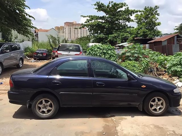 Bán Mazda 323 sản xuất 1997, màu xanh lam, giá tốt