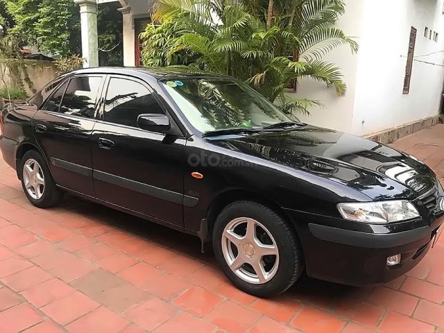 Cần bán gấp Mazda 626 đời 2001, màu đen giá cạnh tranh