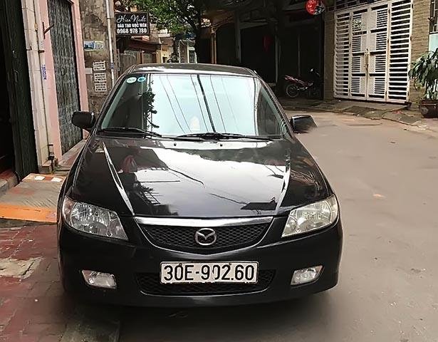 Bán Mazda 323 GLX sản xuất 2003, màu đen, giá tốt0