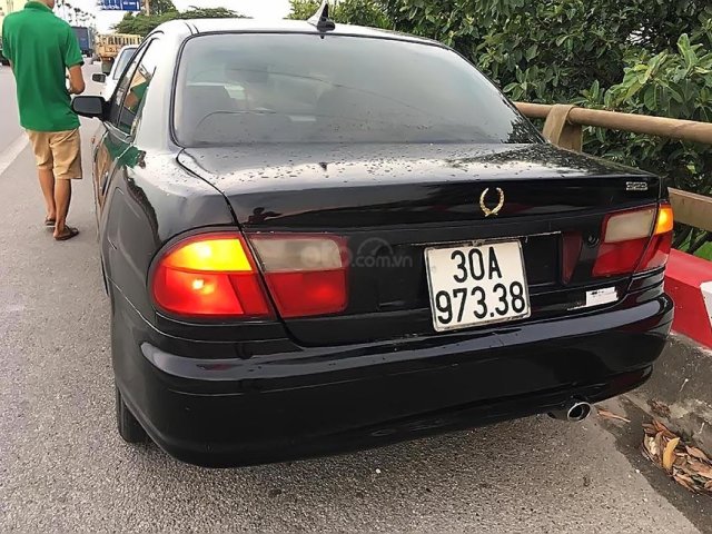 Bán ô tô Mazda 323 năm 1997, màu đen, 65 triệu