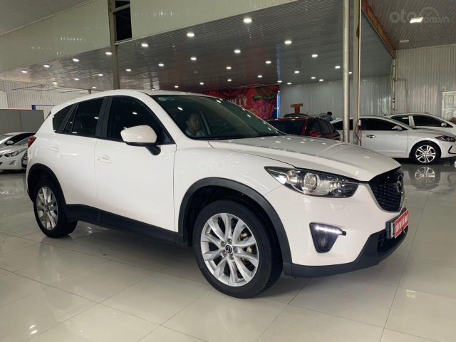 Bán xe Mazda CX 5 năm 2014, màu trắng, mới 95%, giá tốt 680 triệu đồng0