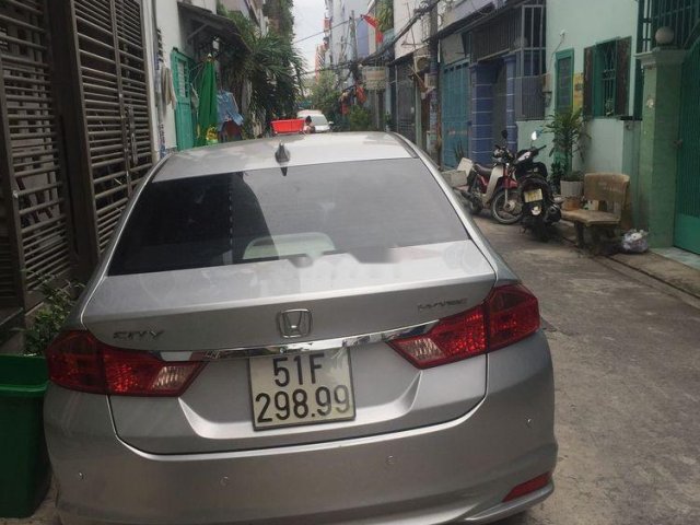 Bán Honda City năm sản xuất 2015, màu bạc0