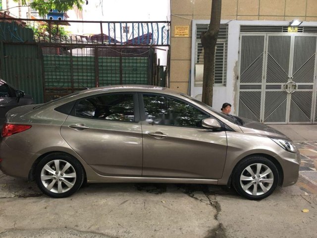 Cần bán Hyundai Accent đời 2013, màu vàng, xe nhập0