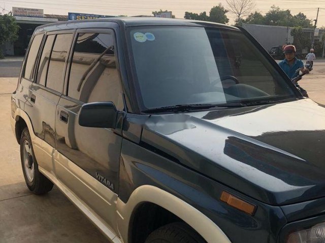 Bán Suzuki Grand vitara năm 2004, màu xanh dưa