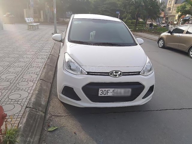 Cần bán xe Hyundai Grand i10 1.2 MT Base đời 2015, màu trắng, nhập khẩu chính chủ