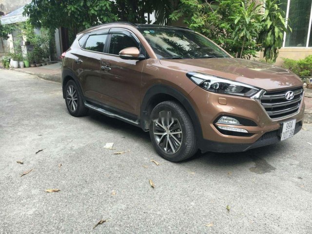 Cần bán Hyundai Tucson đời 2015, màu nâu0