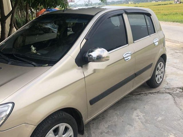 Cần bán lại xe Hyundai Getz sản xuất năm 2010, màu vàng cát còn mới