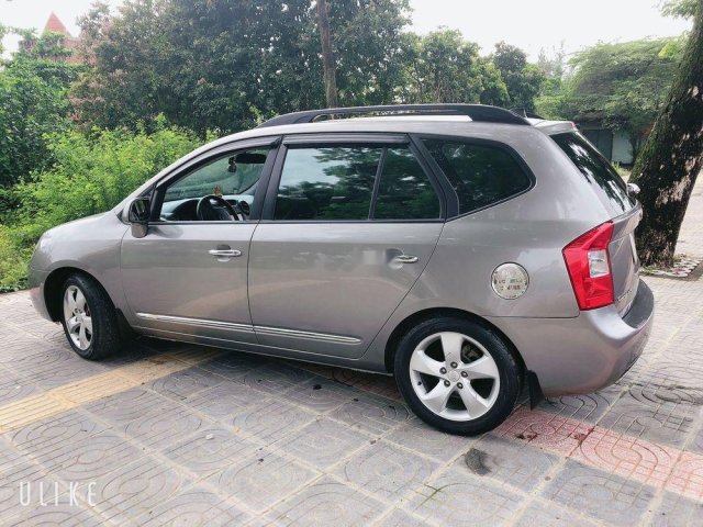 Bán xe Kia Carens 2.0AT đời 2009, màu nâu xe gia đình, 318 triệu0