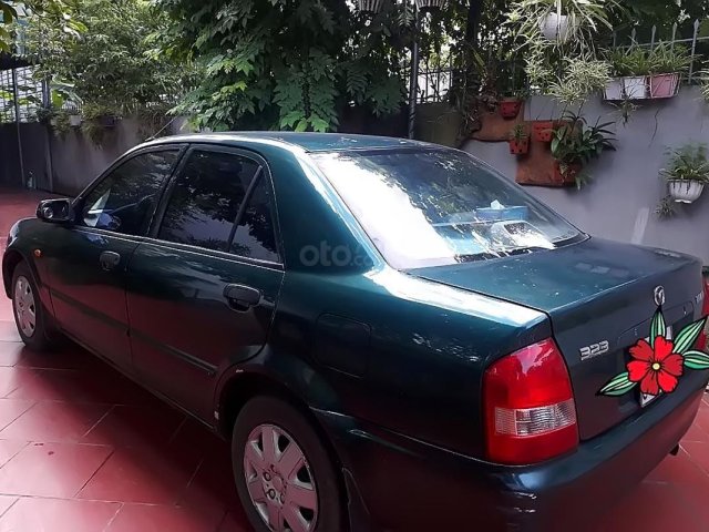 Xe Mazda 323 Standard đời 2002, màu xanh lam, giá 165tr