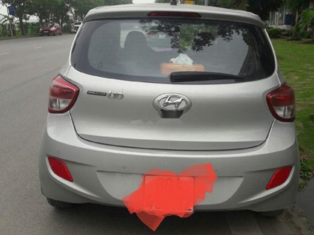 Bán ô tô Hyundai Grand i10 sản xuất năm 2015, màu bạc, xe nhập