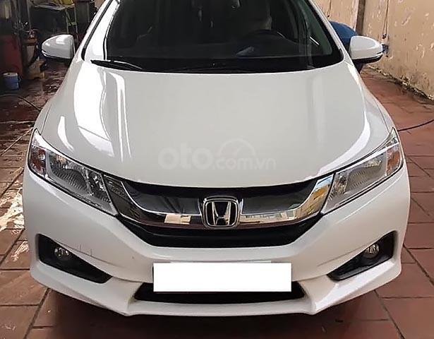 Cần bán gấp Honda City 1.5 AT đời 2016, màu trắng xe gia đình0