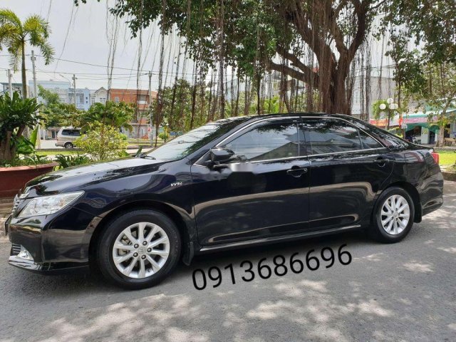 Bán Toyota Camry đời 2013, màu đen xe gia đình0