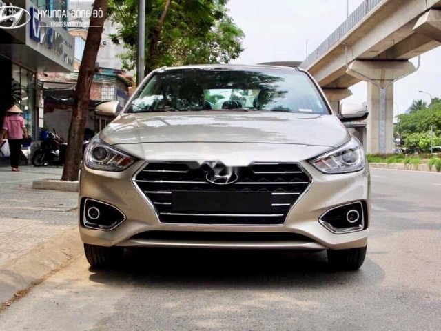 Cần bán Hyundai Accent đời 2019, màu vàng0