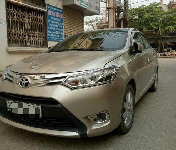 Chính chủ bán Toyota Vios G đời 2014, màu vàng cát0